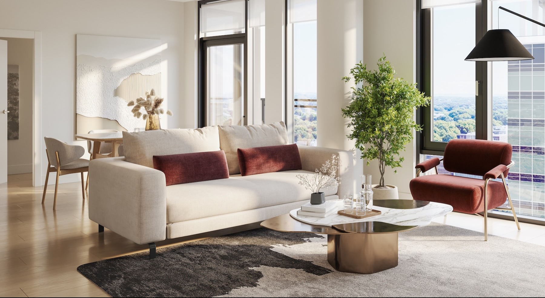 a living room with a couch, coffee table and a chair