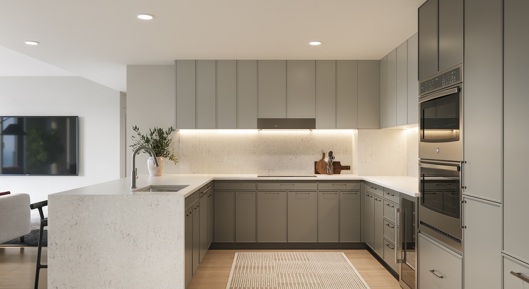 a kitchen with grey cabinets