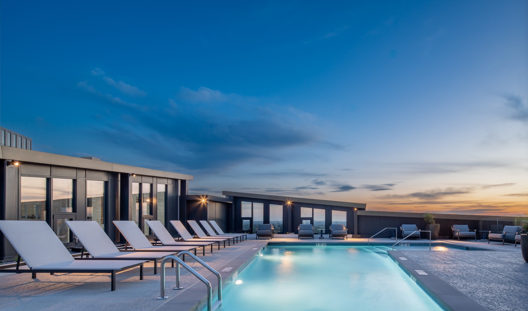 rooftop pool at sunset