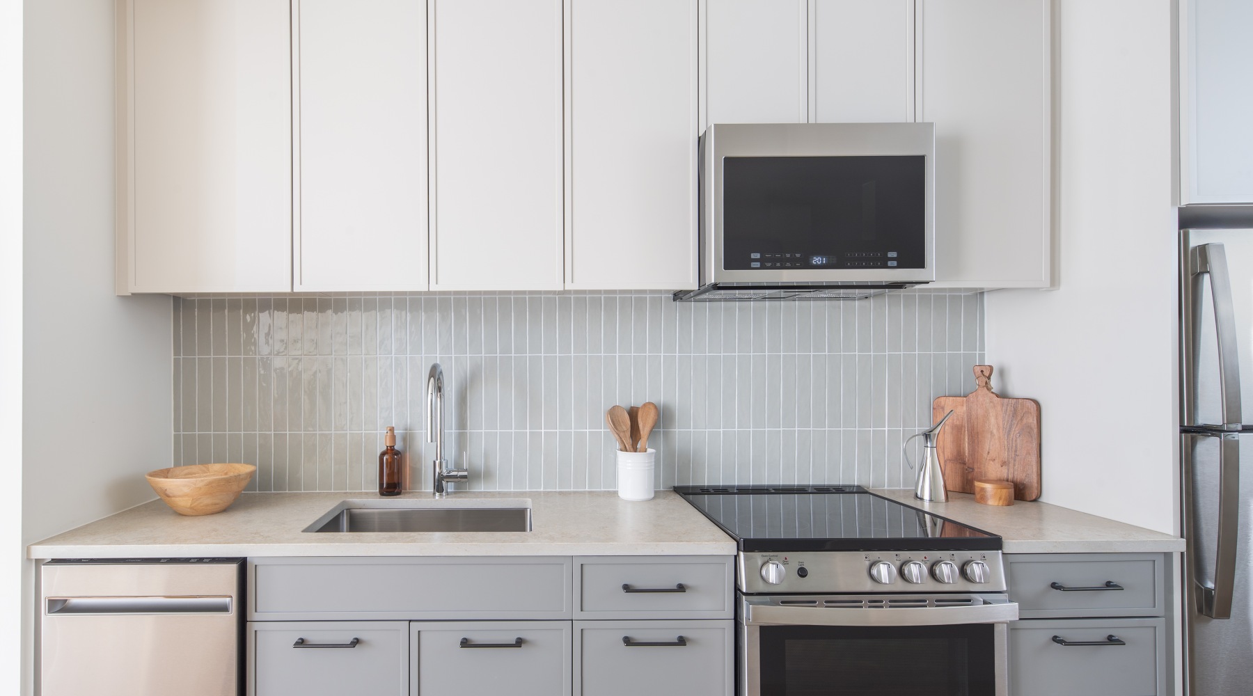 a kitchen with white cabinets