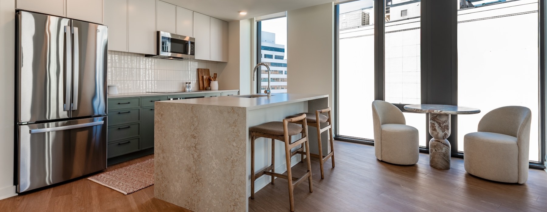 a kitchen with white cabinets