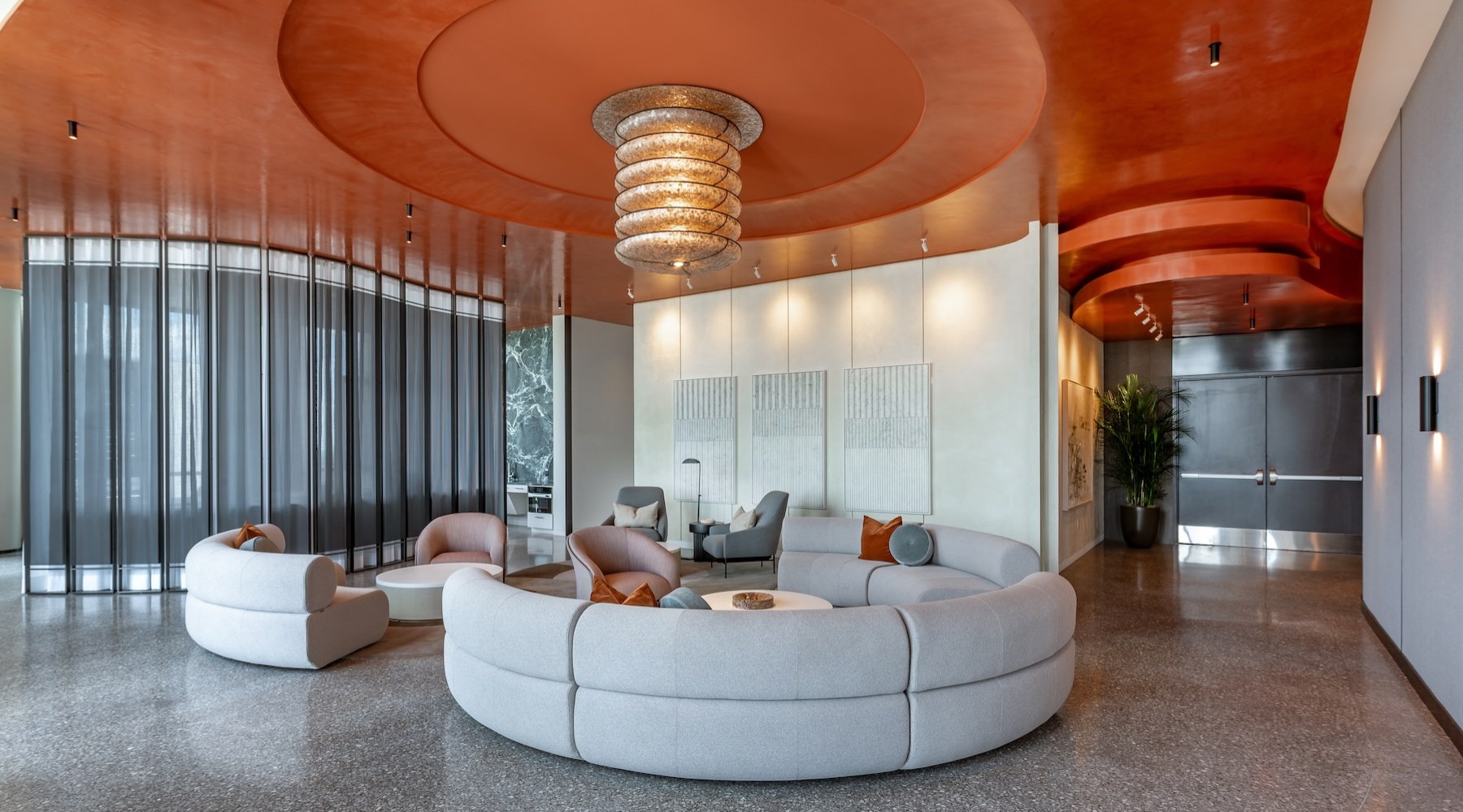 a lobby with couches and chairs