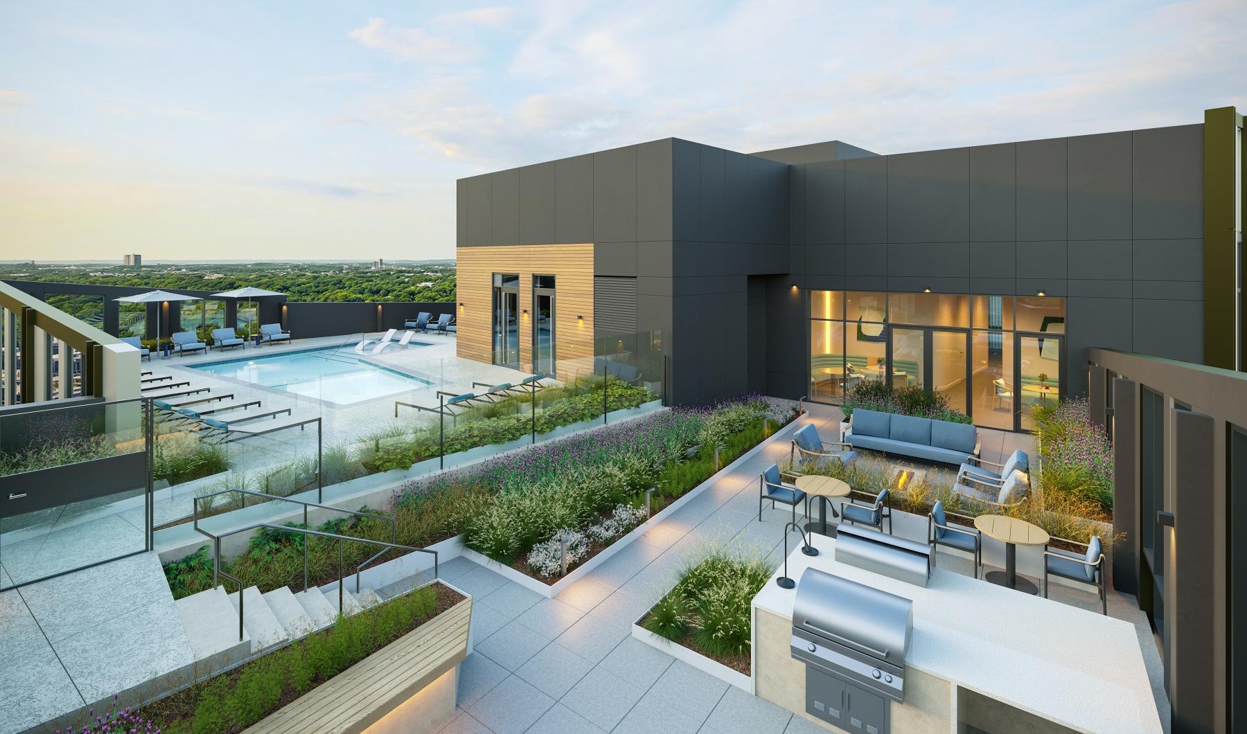 a building with a pool and patio