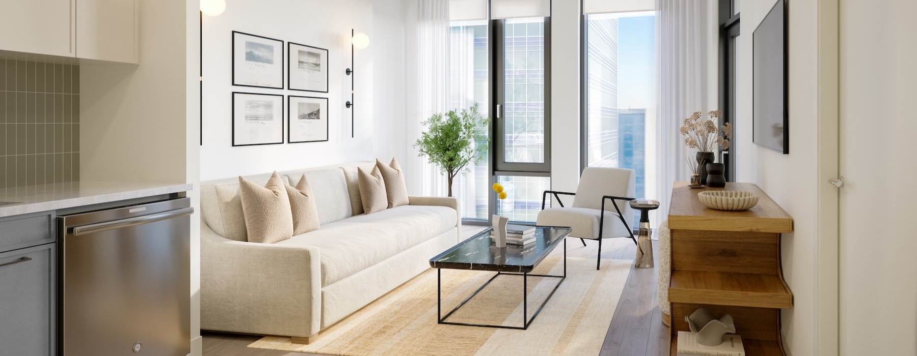 a living room with a couch, coffee table and chair