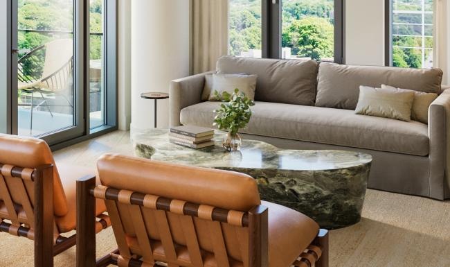 a living room with a couch and coffee table